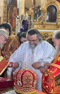 Bishop Vissarion being vested